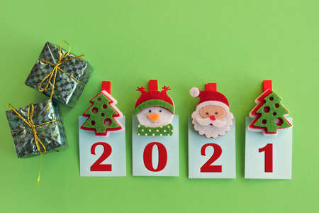 Happy New Year 2021. Symbol from number 2021 on green background