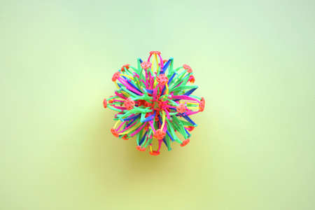 Hoberman sphere. Folding ball of rainbow colors on a light background.の写真素材