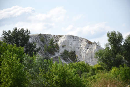 Chalk mountains surrounded by forests and fields in the Kharkiv region. beautiful scenery.の写真素材