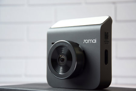 Kharkiv, Ukraine - December 15, 2021: Selective focus camera dvr xiaomi 70mai. car appliances.