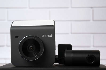 Kharkiv, Ukraine - December 15, 2021: Selective focus camera dvr xiaomi 70mai. car appliances.