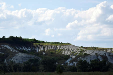 Chalk mountains surrounded by forests and fields in the Kharkiv region.