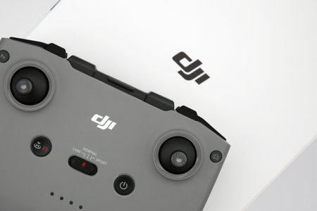 Kharkiv, Ukraine - September 12, 2022: A new DJI Mavic 3 drone on light background.のeditorial素材