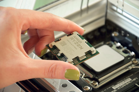 UKRAINE, KHARKIV, NOVEMBER 14, 2022: Close-up of an AMD Ryzen 9 3900X processor installed on a motherboard ASUS ROG STRIX X670Eのeditorial素材