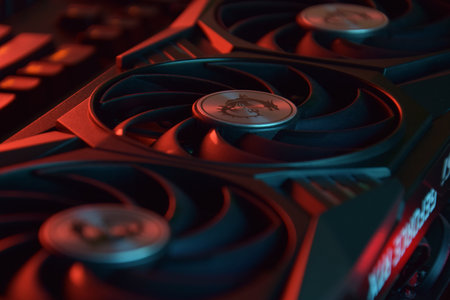 UKRAINE, KHARKIV, NOVEMBER 14, 2022: MSI Geforce RTX 3090 Ti gaming X TRIO graphics card, dark background. Hardware components for build PC or mining rig.のeditorial素材