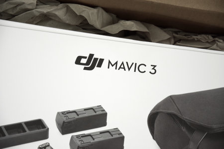 Kharkiv, Ukraine - September 12, 2022: A new DJI Mavic 3 drone on light background.のeditorial素材