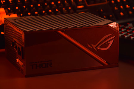UKRAINE, KHARKIV, NOVEMBER 14, 2022: Computer AC power supply Asus Rog Thor 1000w on a dark background.のeditorial素材
