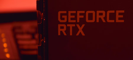 UKRAINE, KHARKIV, NOVEMBER 14, 2022: MSI Geforce RTX 3090 Ti gaming X TRIO graphics card, dark background. Hardware components for build PC or mining rig.のeditorial素材