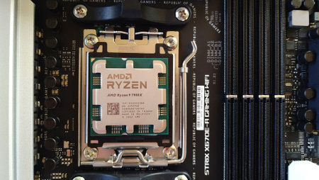 UKRAINE, KHARKIV, NOVEMBER 14, 2022: Close-up of an AMD Ryzen 9 3900X processor installed on a motherboard ASUS ROG STRIX X670Eのeditorial素材