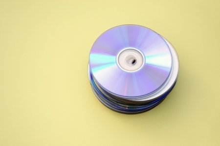 Lots of old CDs are laid out as a background. Bright background. vintage.の写真素材