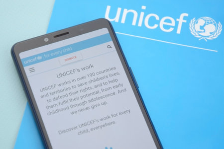 UNICEF website on phone - United Nations International Childrens Fund.のeditorial素材