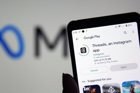 Kharkiv, Ukraine, July 06, 2023: Threads app logo seen on screen. The new application by Meta Platforms is Twitter competitor.のeditorial素材