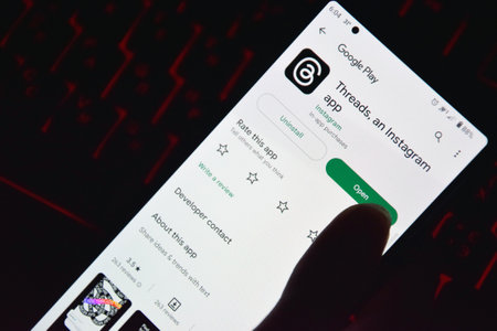 Kharkiv, Ukraine, July 06, 2023: Threads app logo seen on screen. The new application by Meta Platforms is Twitter competitor.のeditorial素材