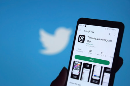 Kharkiv, Ukraine, July 06, 2023: Threads app logo seen on screen. The new application by Meta Platforms is Twitter competitor.のeditorial素材
