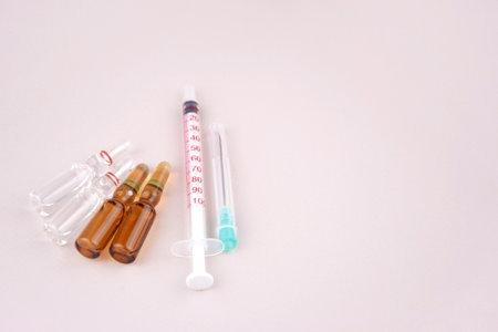Many medical ampoule on light background. Medicine concept. Vials for medical injection.の写真素材