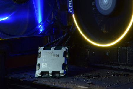 UKRAINE, KHARKIV, NOVEMBER 14, 2022: Close-up of an AMD Ryzen 9 7900X processor, against the backdrop of coolers with light.のeditorial素材