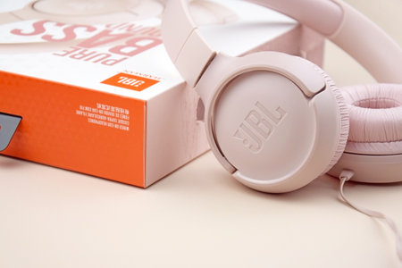 Kharkiv, Ukraine, July 06, 2023: JBL T500 Pink wired headphones with deep bass.のeditorial素材
