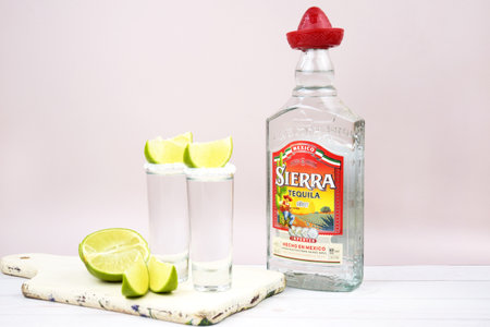 Kharkiv, Ukraine, JULY 11, 2023: Bottle of Sierra tequila on a light background. Tequila is a type of alcoholic drink made from the blue agave plant.のeditorial素材