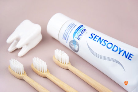 Kharkiv, Ukraine, AUGUST 19, 2023: A box of Sensodyne toothpaste on a light background. Sensodyne is a GlaxoSmithKline product.のeditorial素材