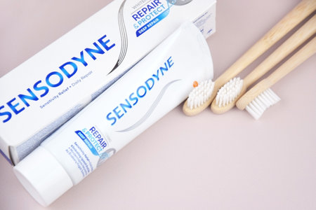 A box of Sensodyne toothpaste on a light background. Sensodyne is a GlaxoSmithKline product.