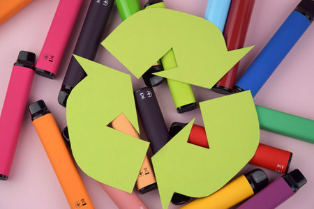 Recycling of used disposable vapes. Symbol of ecological disposal of vapes.