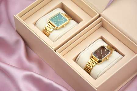 Closeup minimal fashion wristwatch for women on pink background.の写真素材