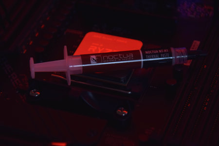 Noctua CPU thermal paste on a dark background