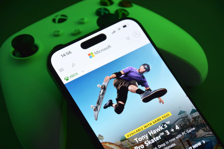 Kharkiv, Ukraine - July 10, 2025: The white Xbox controller with green light.