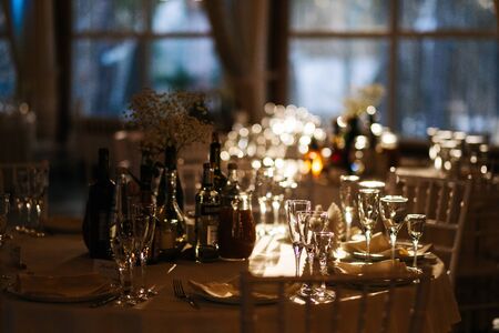 Serving of a festive table. Wedding dinner in the sunの写真素材