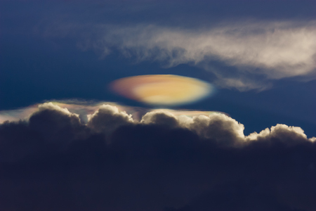 Storm cloud show iridescence cloud shape like an UFOの写真素材