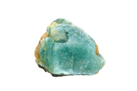 Rough Grandidierite gemstone on white background (selective focus). A member of rarest gemstone in...