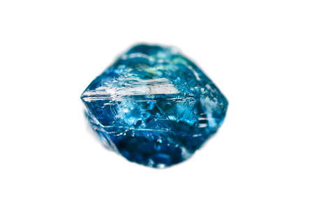 Rare rough uncut blue diamond crystal on white backgroundの写真素材