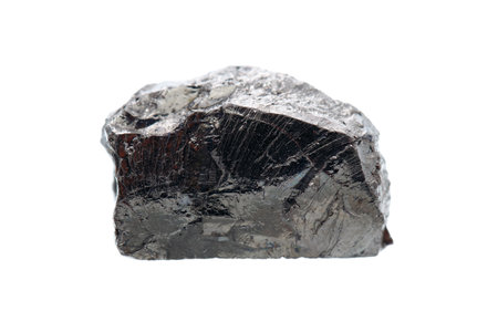 Natural rough elite shungite (noble grade) on white background. A high carbon mineraloid (more than...