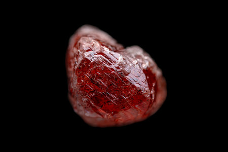 Rare natural rough uncut red diamond with trigon party on dark background (selective focus)の写真素材