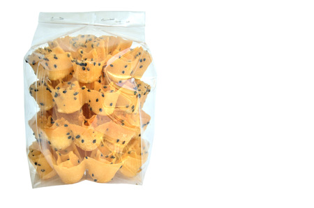 Crispy lotus blossom cookie,Thai cookies ,snack,Crispy in a bag plastic ,isolate on white backgroundの写真素材
