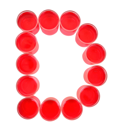 One letter of the alphabet. red drink in a glassの写真素材