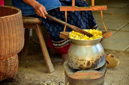 Boiling silk worm cocoon for making the silkの写真素材