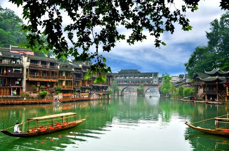 HUNAN, CHINA - JUNE 16, 2014 : Old houses in Fenghuang county in Hunan, China. The ancient town of Fenghuang was added to the World Heritage Tentative List in the Cultural categoryのeditorial素材