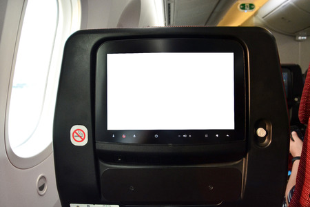 close up white LCD monitor screen behind passenger window seat, copy spaceの写真素材