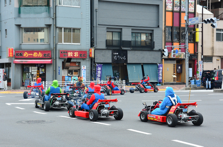 Tokyo, Japan - March 7, 2018 : Street kart tour, Mario kart tour is tourists dress up in superhero character costume and driving go-kart through the main travel attractions in the city of Tokyoのeditorial素材