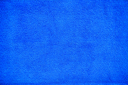 clipping path, close up of fold multi purpose blue micro fiber cloth isolated on white background