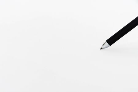 pen on white paper background (selective focus)の写真素材