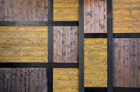 vintage yellow and dark brown color lumber background, old Japan pine wood plank wall texture bacground, Japanese styleの写真素材