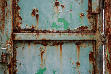Rusty on old green metal door