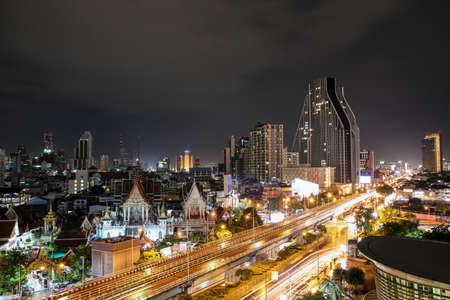 Night view of buildings in Bangkok city.