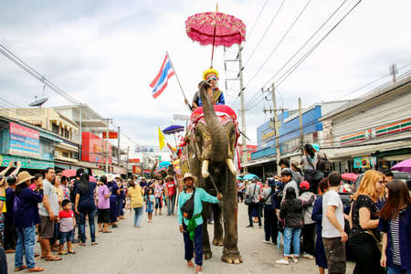 Srisatchanalai District, Sukhothai, Thailand - April 7, 2018 : Sukhothai ordination parade on elephant back festival. Tourist and many people come to watch and enjoy before songkran festival.のeditorial素材
