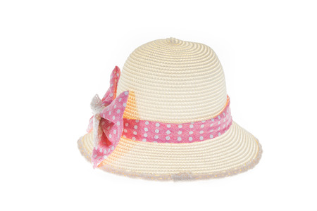 Pretty straw hat with pink ribbon on white の写真素材