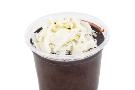 coffee and chocolate mousse with wheat flour on top on white background isolatedの写真素材