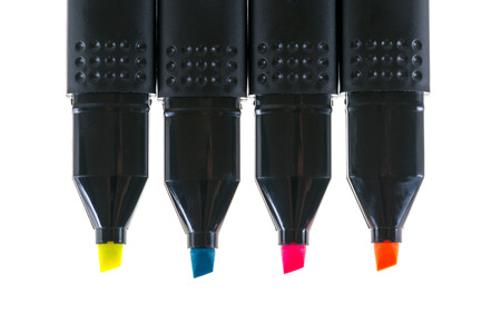 Multicolored highlighters arrange in a row. Isolated on white backgroundの写真素材