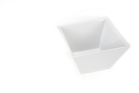 empty square cone shape bowl isolated on white backgroundの写真素材